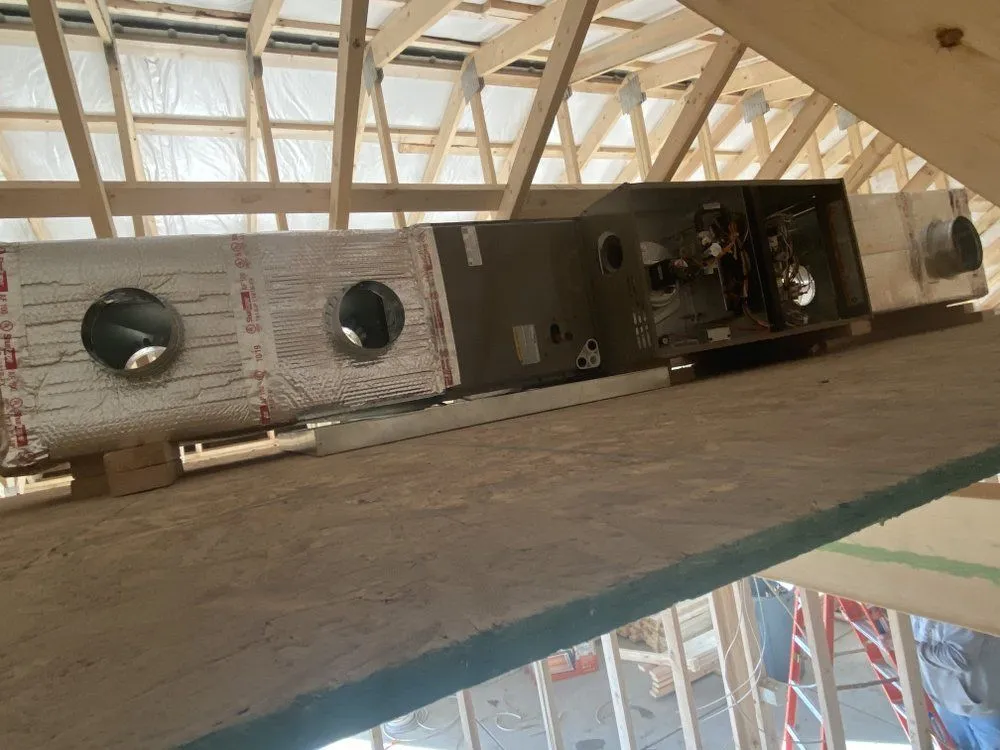 Attic HVAC installation in progress