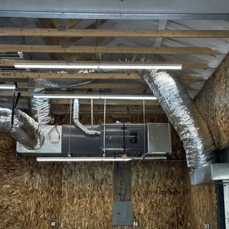 Ceiling with exposed HVAC ducts