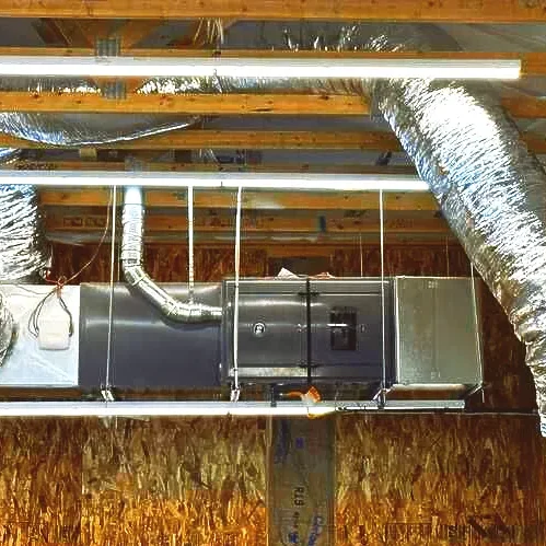 Exposed ductwork in wooden ceiling